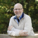 headshot of author roger leslie phd