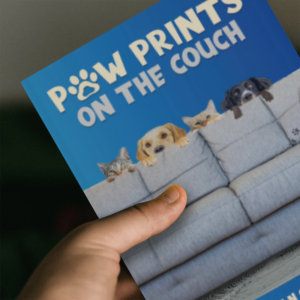 cover of paw prints on the couch