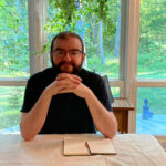 headshot photo of author joshua lange