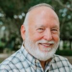 headshot photo of author tim hunniecutt