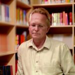 headshot photo of author thomas lopinski