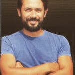 headshot photo of author tom haward