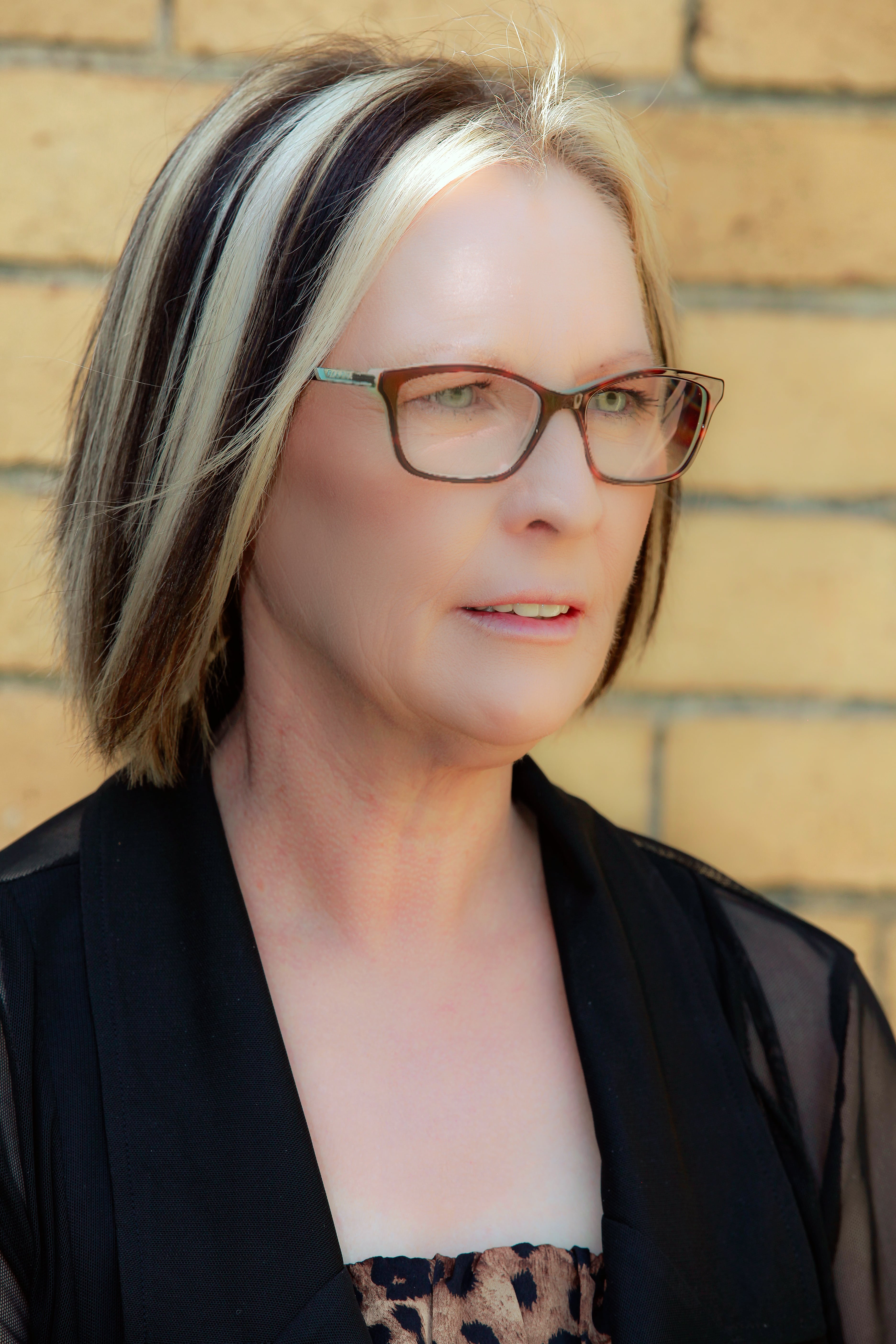 headshot photo of author Jo Cooling