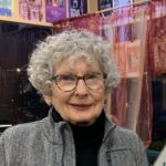 headshot photo of author judith works