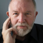 headshot photo of author carlton davis