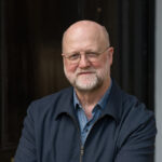 headshot photo of author William Campbell Powell