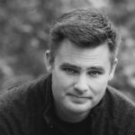 headshot of author joel mcKay