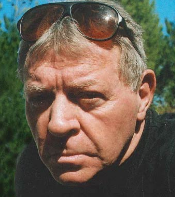 headshot photo of author John Isaac Jones