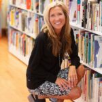 photo of author raven howell in a library