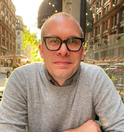 headshot photo of poet mike carlson
