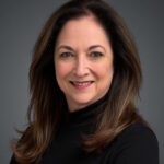 headshot photo of author margaret izard