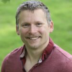 headshot photo of writer eric fisher