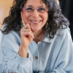 headshot photo of writer nina amir